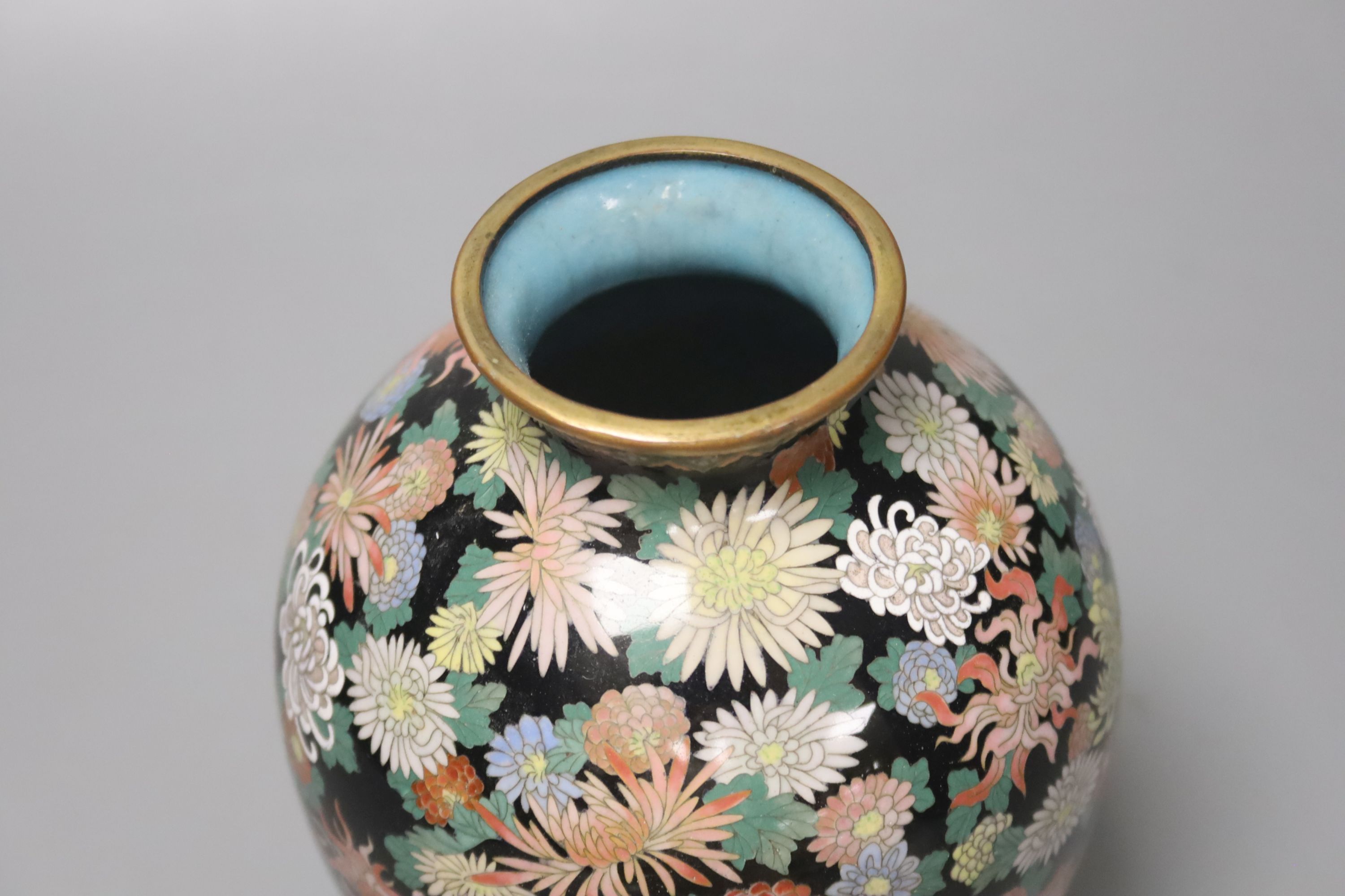 A Japanese silver wire cloisonne vase, decorated with flower heads, possibly Inaba, 16cm high